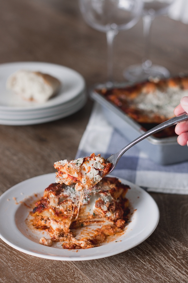 cheesy lasagna with fork